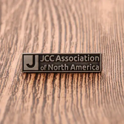 24. JCC Custom Metal Pins