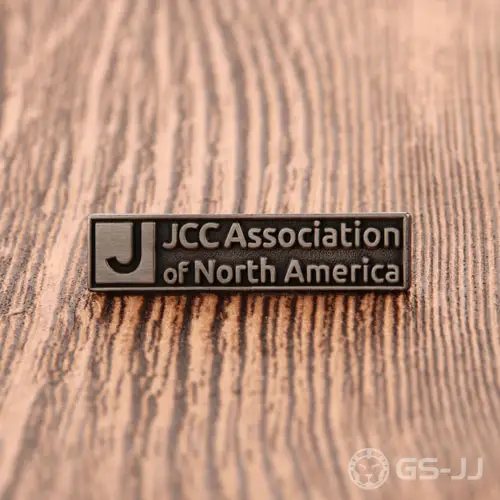 24. JCC Custom Metal Pins 24. JCC Custom Metal Pins