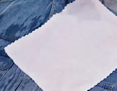 Place damp cloth over patch