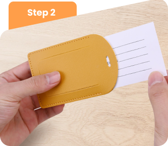 Securely place the card inside the luggage tag. Securely place the card inside the luggage tag.