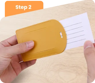 Securely place the card inside the luggage tag.