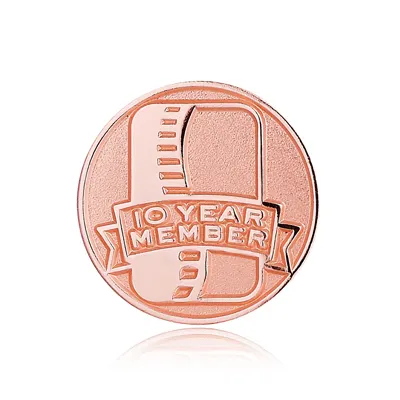 Die struck pins for 10 year member Die struck pins for 10 year member