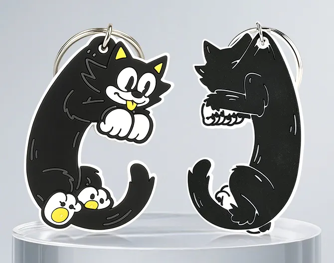 Double-sided PVC keychain with cartoon cat design Double-sided PVC keychain with cartoon cat design
