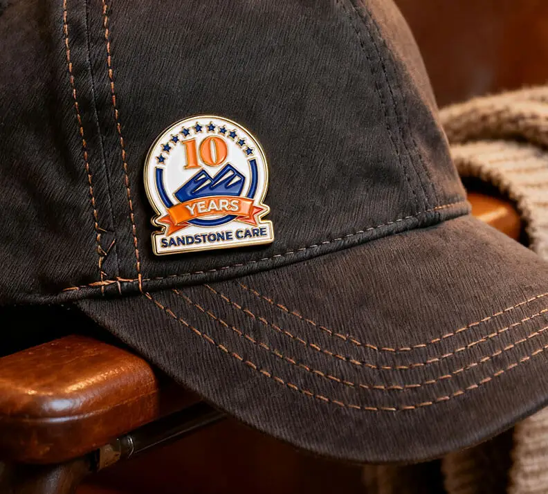 Sandstone Care 10 Years Custom Enamel Pin Sandstone Care 10 Years Custom Enamel Pin