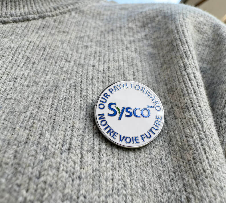 Sysco Corporate Vision Bilingual Enamel Pin