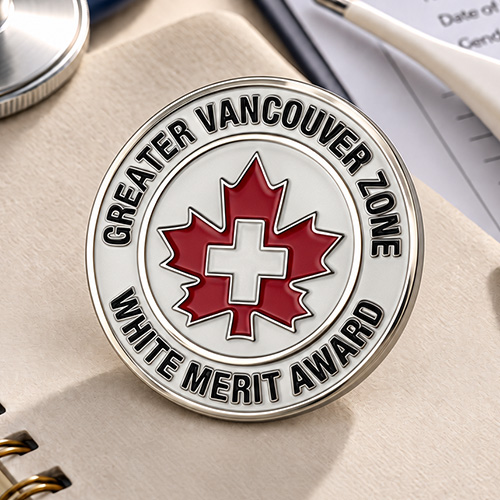 Greater Vancouver Zone White Merit Award nursing pins with red maple leaf