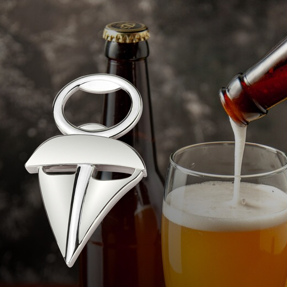 Personalized--A free customizable sailboat-shaped metal keychain that can be used as a bottle opener