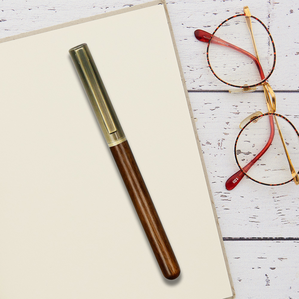 Vintage Wooden Gift Pen On Book 