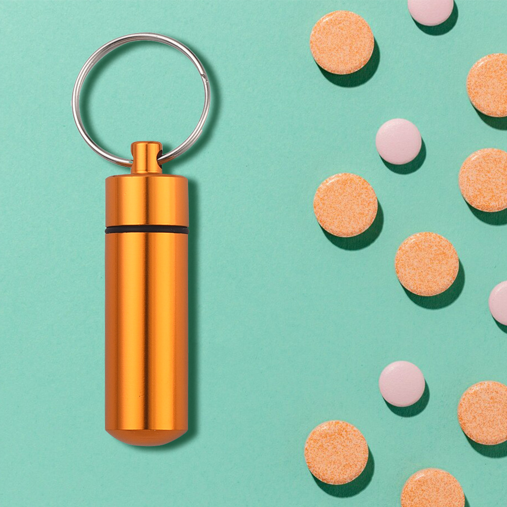 Round Three-compartment Metal Pill Box Keychain scene