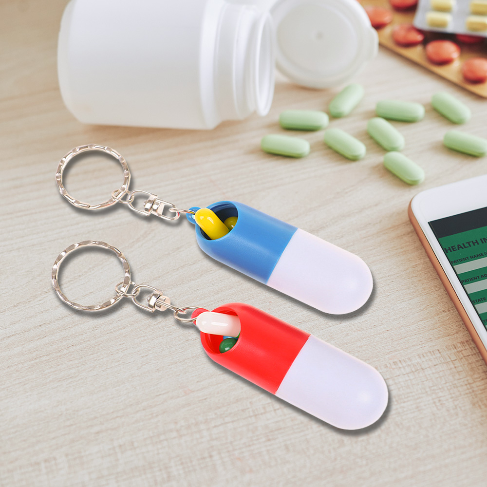 Customized ABS Mini Capsule Pill Box Keychain scene