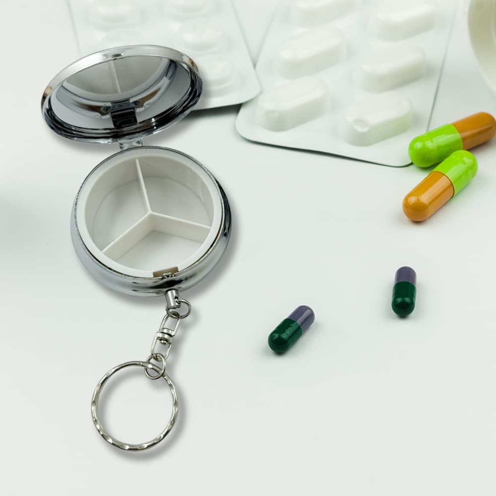 Metal three-compartment pill box keychain scene