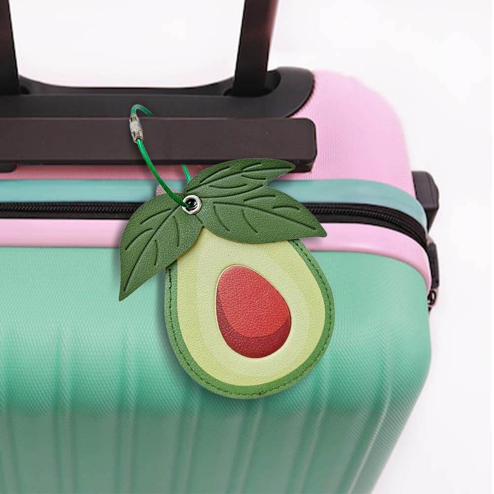 Lifestyle shot of Creative Avocado Top Layer Leather Luggage Tag 