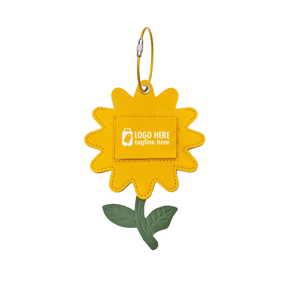 Bagagelabel van koeienhuid met zonnebloemmotief en logo