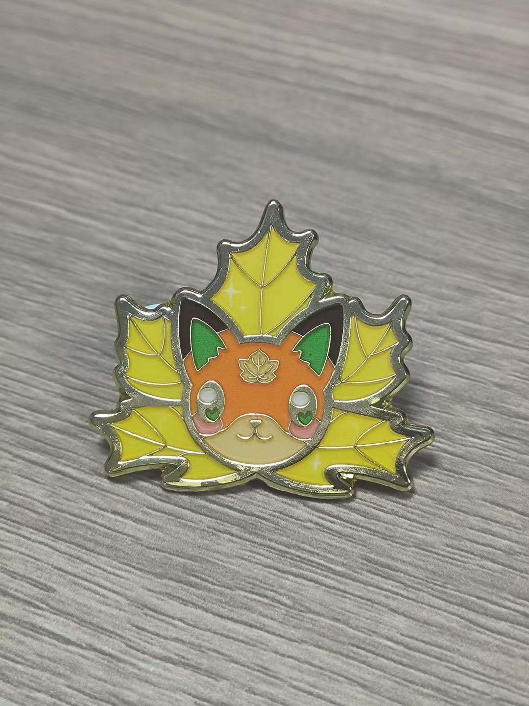 Maple Leaf with Fox Head Pins