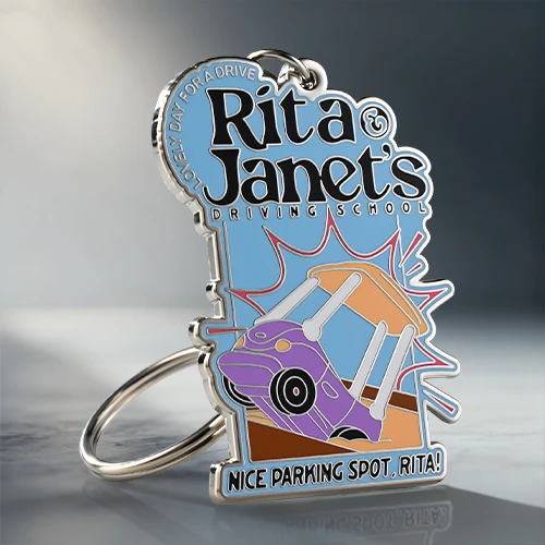 Rita & Janet's Driving School Hard Enamel Keychain Rita & Janet's Driving School Hard Enamel Keychain