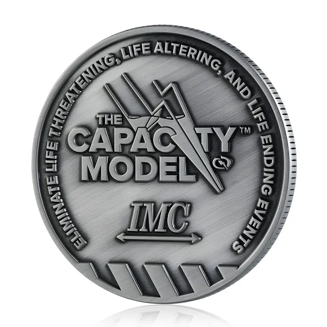 The Capacity Model IMC "Eliminate Life Threatening" Reeded Edge Challenge Coin